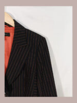 Chaqueta Escada negra con rayas naranjas "diplomática" talla 42. Sin estrenar.