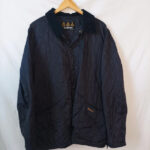 Barbour acolchada azul oscuro con cuello pana talla XL