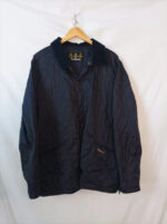 Barbour acolchada azul oscuro con cuello pana talla XL
