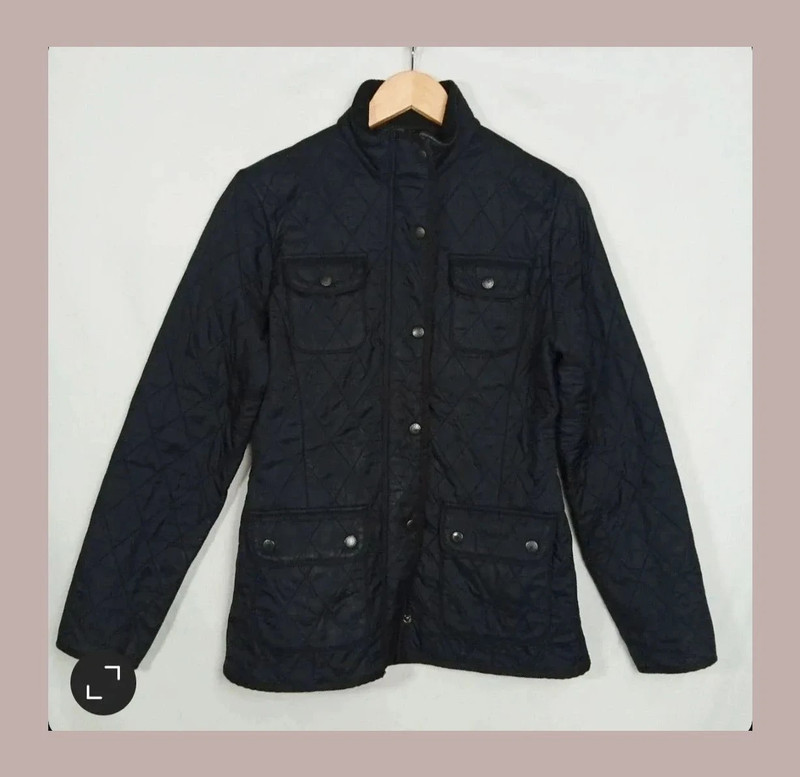 e97c4429-6856-496e-ae69-814429fd0ee7.jpeg cazadora Barbour negra acolchada talla 38